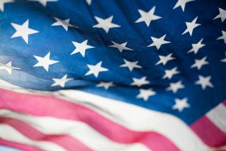 U.S.A. flag by Lucas Sankey courtesy of Unsplash.